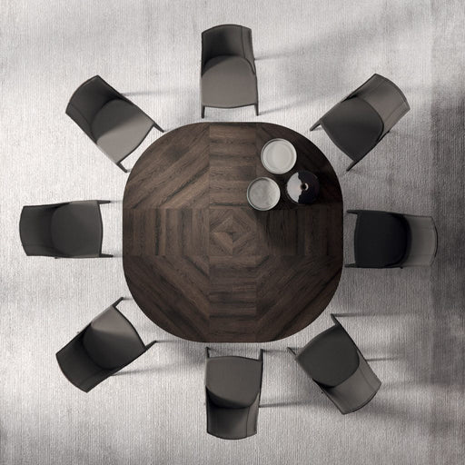 This illustration features a top-down view of a modern conference room with a round wooden table surrounded by eight black and gray chairs, ideal for business meetings and discussions.