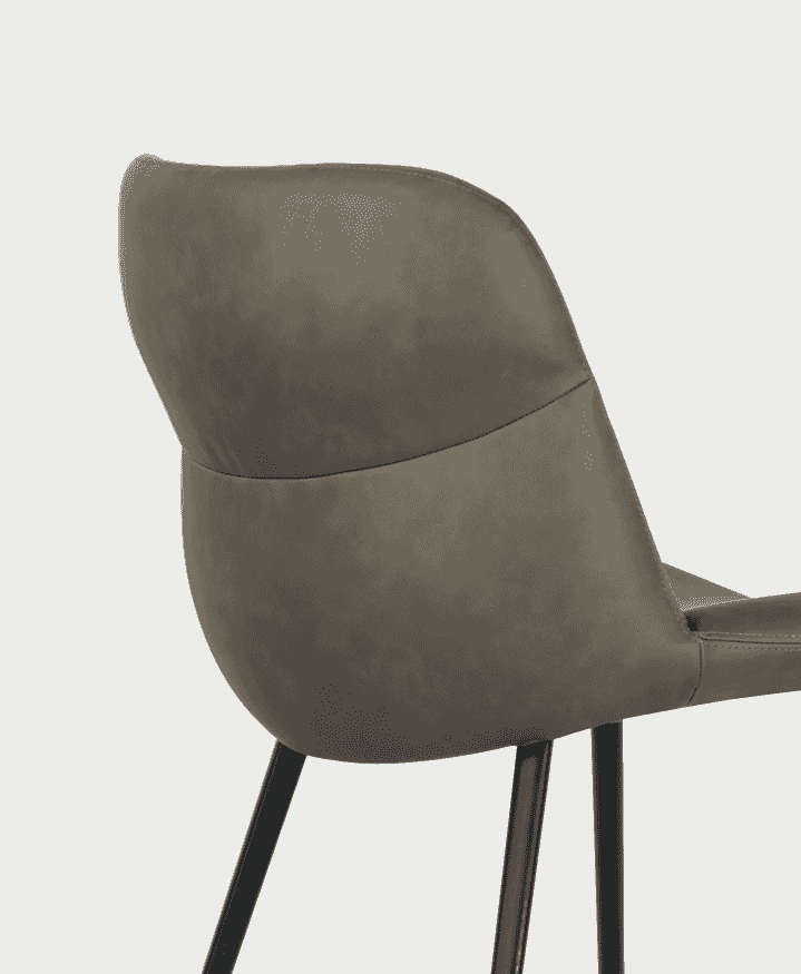 Close-up of the New CS2239 Onda Dining Chair by Calligaris showcasing its curved backrest and sleek metal legs in taupe finish.