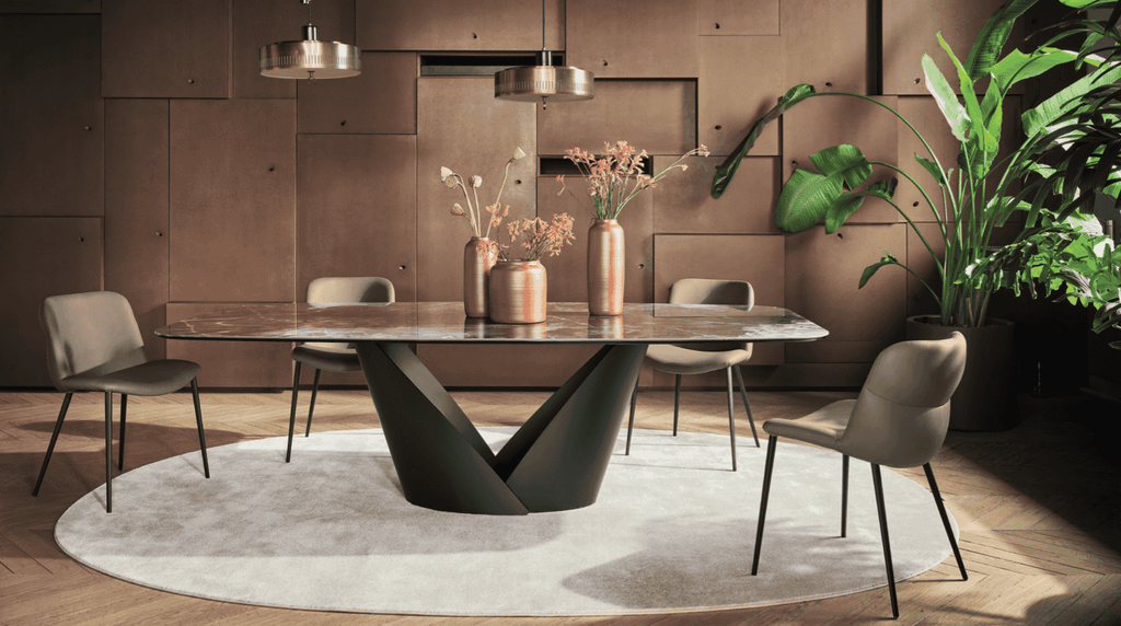 Set of four CS2239 Onda Dining Chairs by Calligaris around a sculptural dining table in a stylish, contemporary dining room.