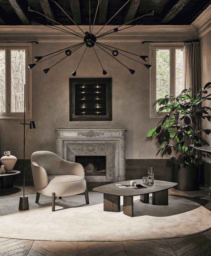 Elegant living room featuring CS3463 Holly Fab Lounge Chair by Calligaris in beige, styled with a fireplace and contemporary decor.