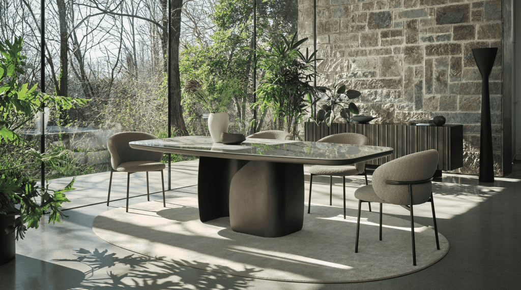 Beige round CS7192 Sky Rug by Calligaris in a sunlit room with modern furniture, blending elegance with natural surroundings.