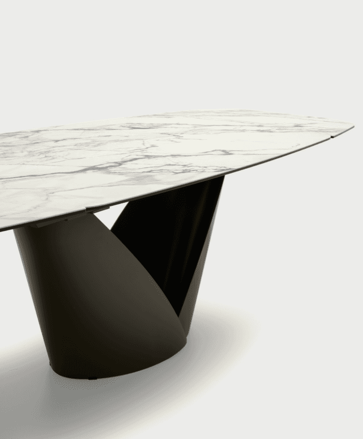 Elegant extending dining table with a white marble top featuring brown veining and a black sculptural base, perfect for modern dining spaces.