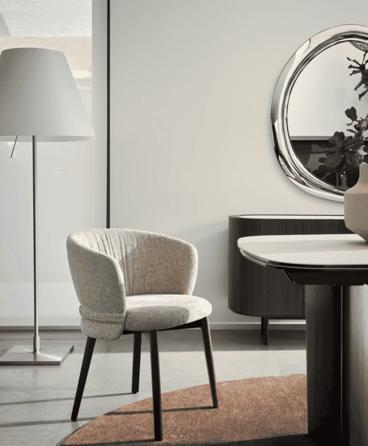 CS2238 Vanilla Dining Chair with Wood Legs by Calligaris.com placed in a modern dining room with minimalist decor and soft lighting.