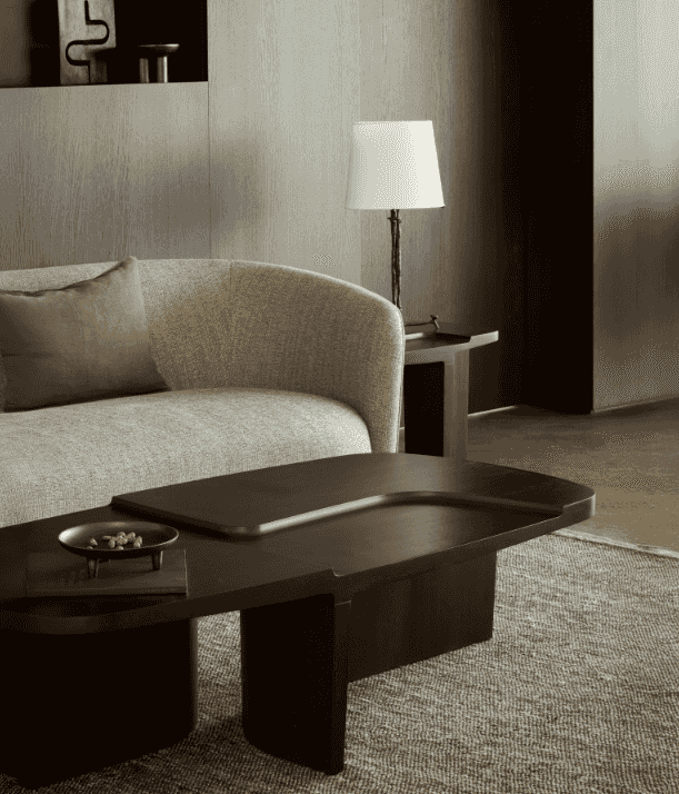 Brutalist Coffee Table in dark wood finish styled in a modern living room with neutral tones, part of Ethnicraft Furniture QUICK SHIP collection.