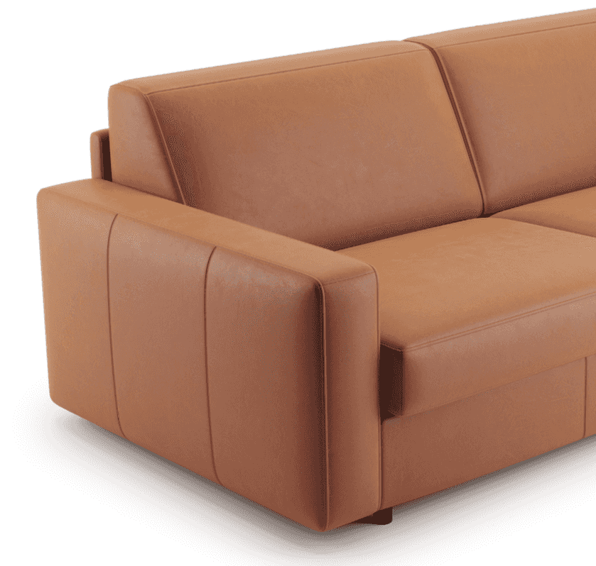 Close-up of Innovation Living Carnell Leather Sleeper Sofa Bed armrest in Martel Cognac leather, showcasing premium stitching and modern design.