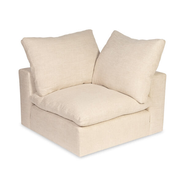 Beige armchair with two cushions on a white background