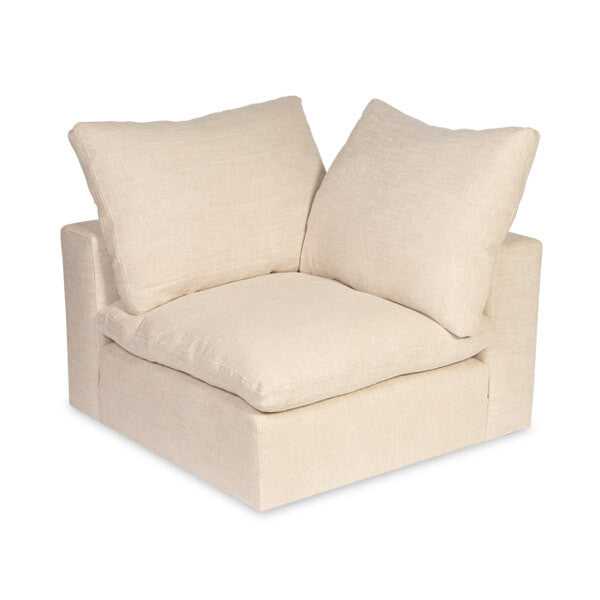 Cream-colored loveseat with soft cushions and wide armrests, ideal for small spaces or as an accent piece