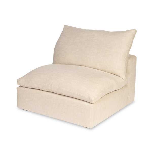 Matching beige lounge chair with comfortable cushion and wide seat, suitable for relaxing or reading