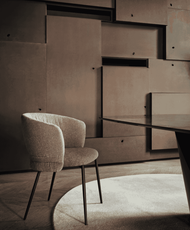 Elegant CS2238 Vanilla Dining Chair with Wood Legs by Calligaris.com in a dark-toned interior, highlighting its contemporary design.