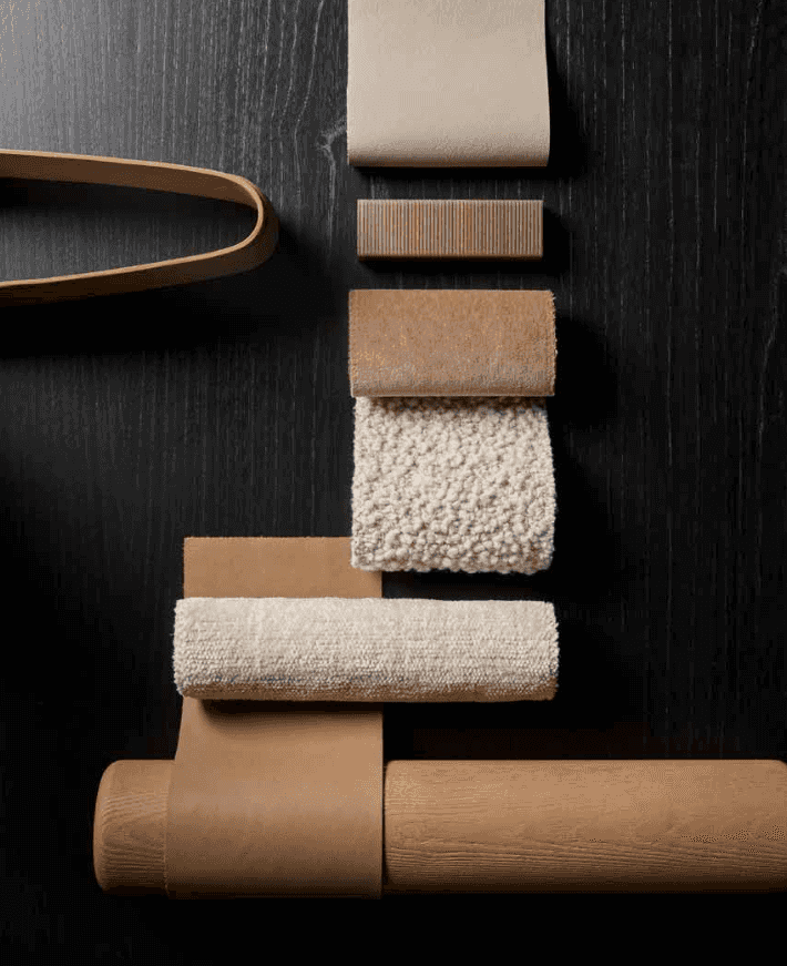 Arrangement of neutral-toned fabric and wood materials, interior design elements for sofa customization