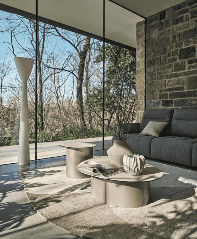 CS3467 Equipe Sofa by Calligaris in a modern living room with floor-to-ceiling windows, blending comfort and Italian design.