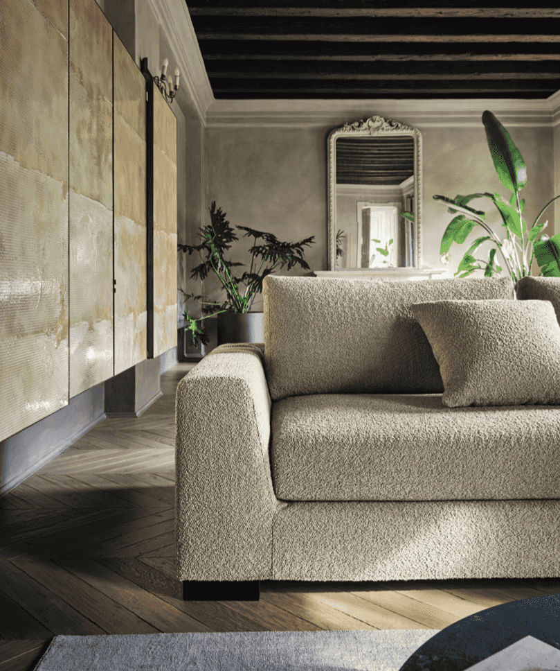 CS348 Sierra Sofa by Calligaris in elegant living room with vintage decor. Italian sectional sofa blends comfort and luxury in a refined setting.