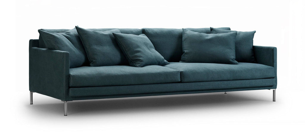 Ash Sofa by Eilersen in deep teal fabric with modern metal legs, customizable at Trade Source Furniture for contemporary interiors.