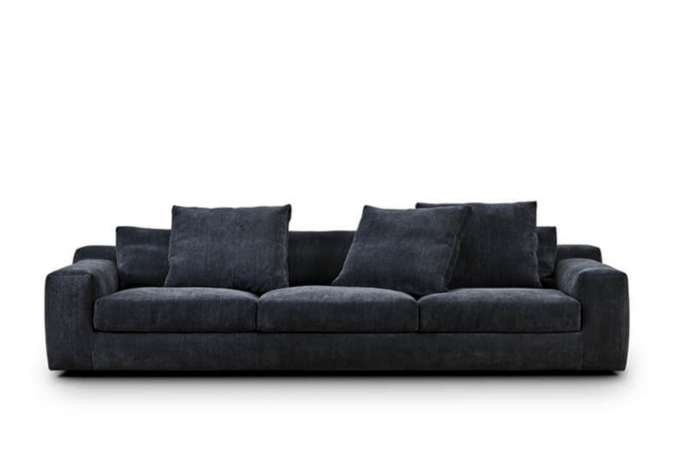 Aton Sofa by Eilersen in dark charcoal fabric with wide armrests and deep seating, featured at Trade Source Furniture.