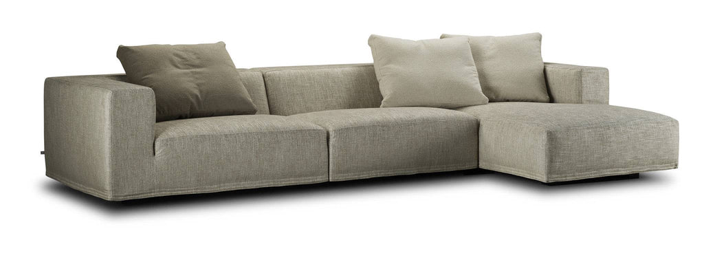 Eilersen Baseline Sofa with Chaise in taupe fabric, featuring three large back cushions and a right-facing chaise configuration.