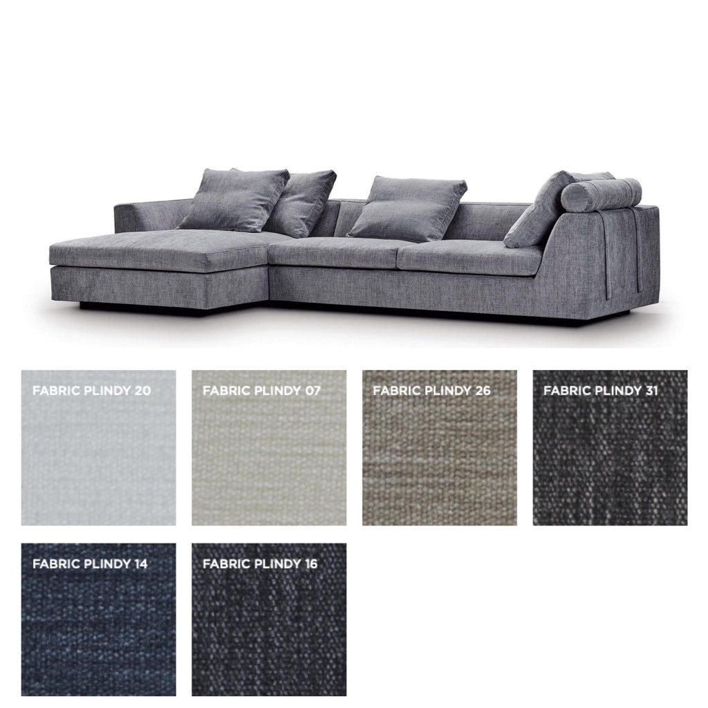 Chess Sofa by Eilersen in dark grey with plush cushions and chaise, ideal for contemporary living room layouts and comfort.