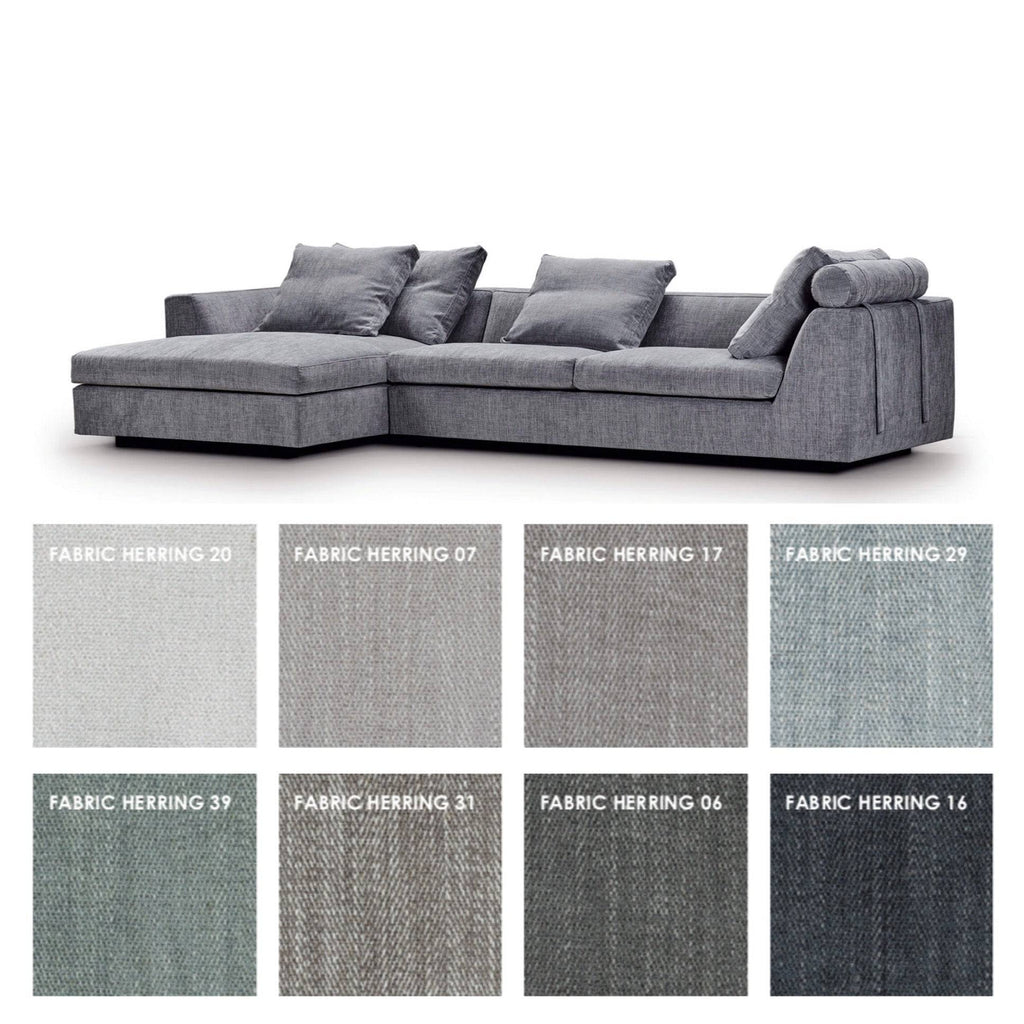 Chess Sofa by Eilersen in dark grey with Plindy fabric swatches, showcasing six fabric options for tailored furniture design.