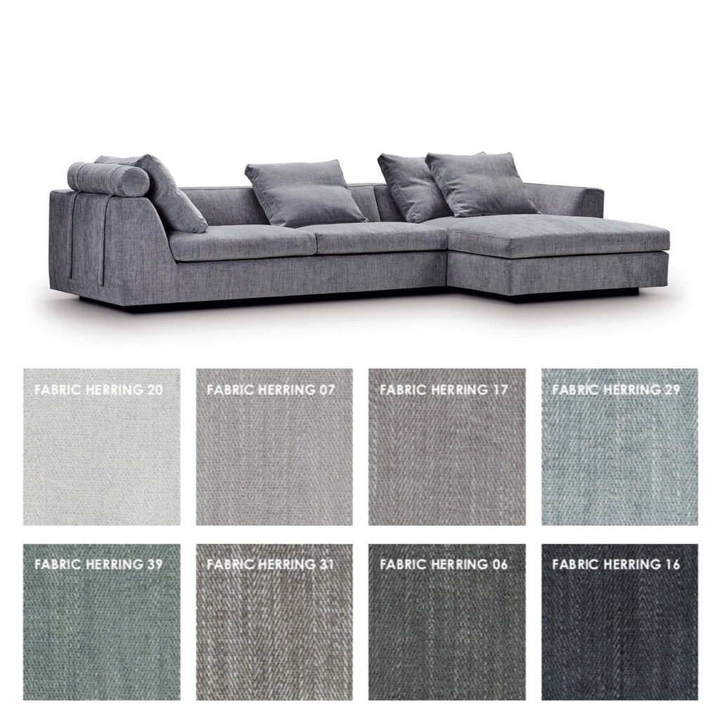 Chess Sofa by Eilersen in dark grey fabric with plush cushions and headrest, designed for modern living room comfort and style.