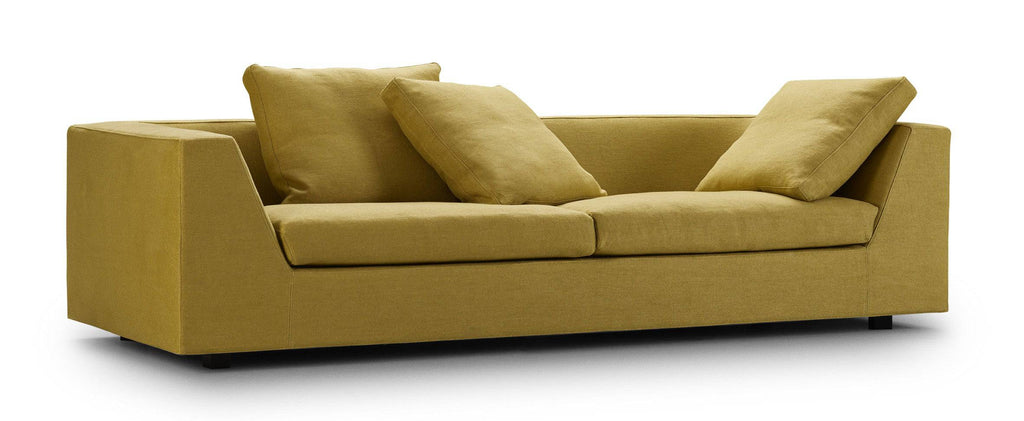 Chess Sofa by Eilersen in dark brown fabric with headrest and plush cushions, designed for comfort and modern aesthetics.