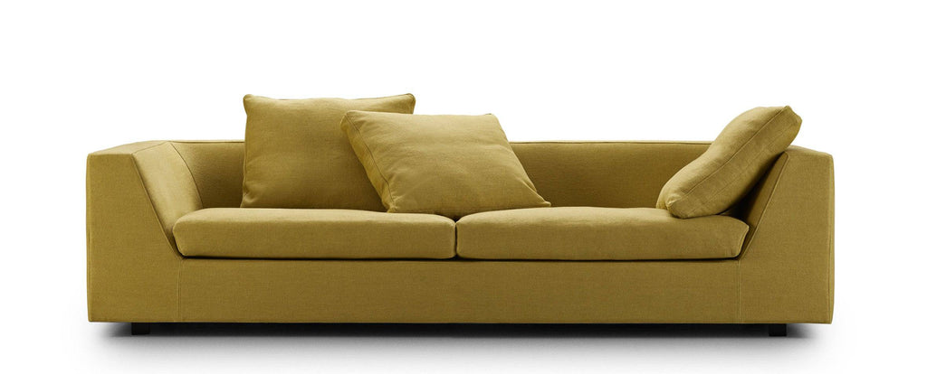 Chess Sofa by Eilersen in mustard yellow fabric with angled armrests and plush cushions, ideal for modern living rooms.