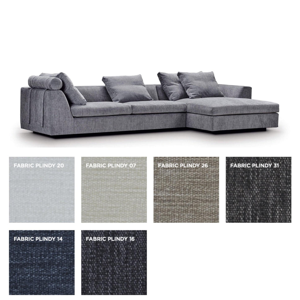 Chess Sofa by Eilersen in dark grey with Gravel fabric swatches displayed, showcasing a variety of textured upholstery choices.