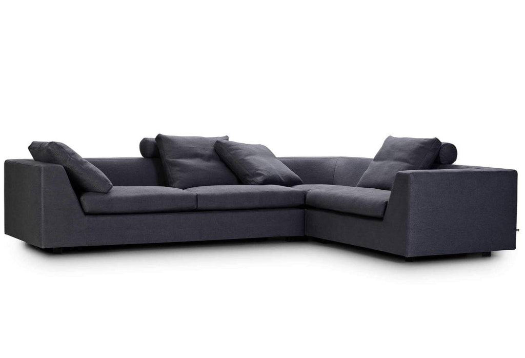 Chess Sofa by Eilersen in dark brown fabric with headrest and deep seats, offering luxurious comfort and modern style.