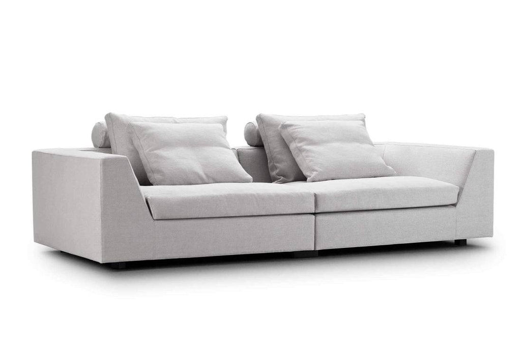 Chess Sofa by Eilersen in dark grey L-shaped configuration with plush cushions, designed for spacious modern living rooms.