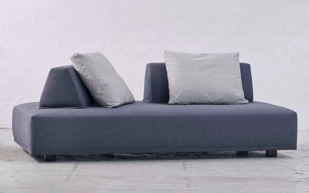Compact version of Eilersen Playground Sofa in dark blue-grey fabric, ideal for small spaces and modern living.