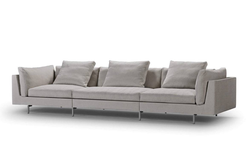 Float High Sectional Sofa by Eilersen in light grey fabric with three modular sections and plush cushions, perfect for contemporary interiors.