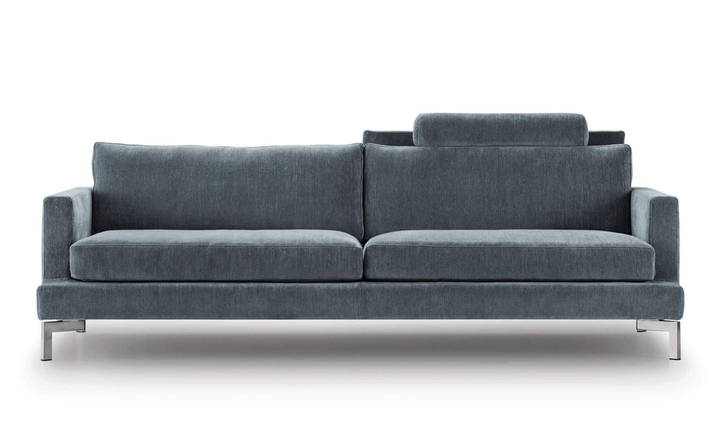The Great Lift Sofa by Eilersen at Trade Source Furniture in blue-gray fabric, featuring a low-profile frame and adjustable headrest.
