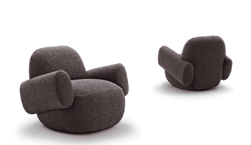 Side and back views of Havana Round Arm Chair by Eilersen in dark boucle, emphasizing its curved armrests and modern form.