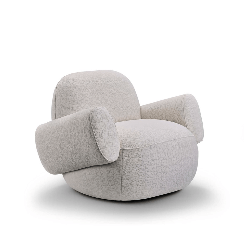 Havana Round Arm Chair by Eilersen in light fabric with plush round arms, displayed on a white background for product showcase.