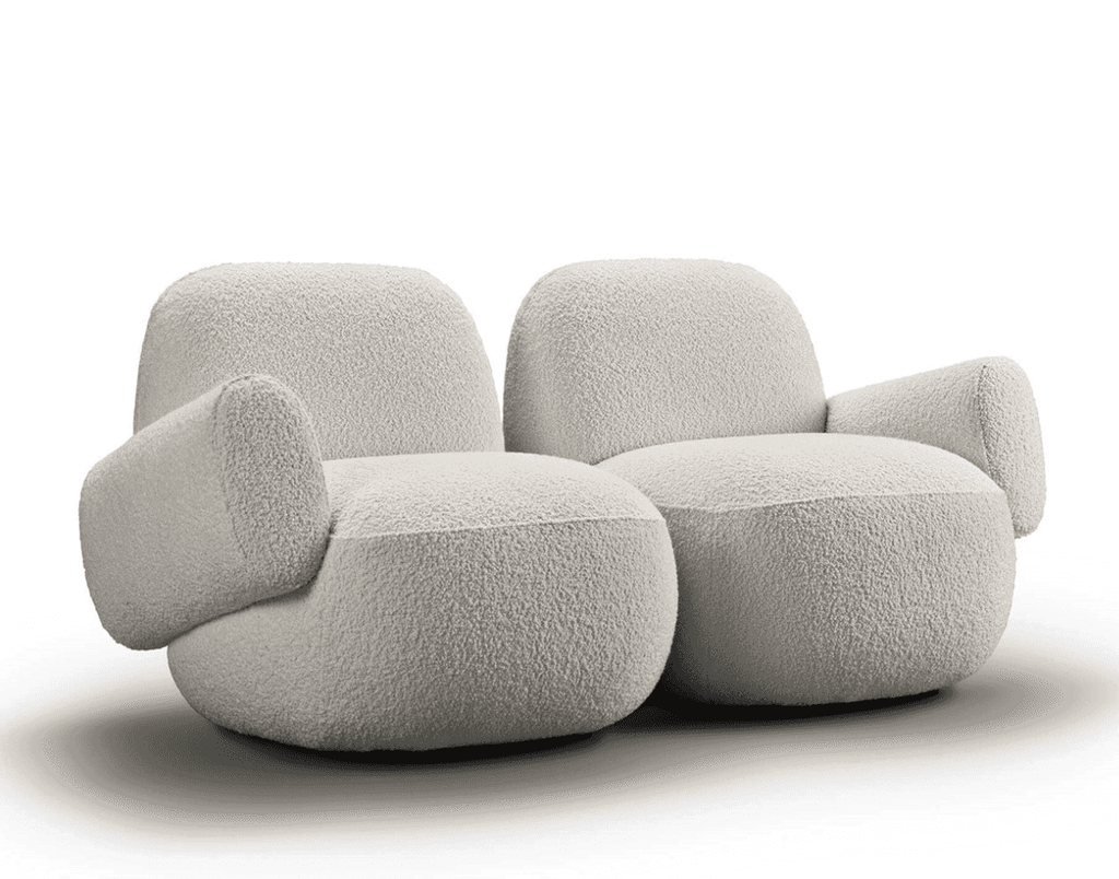 Double-seat version of Havana Round Arm Chair by Eilersen in light boucle, featuring plush curves and modern design.