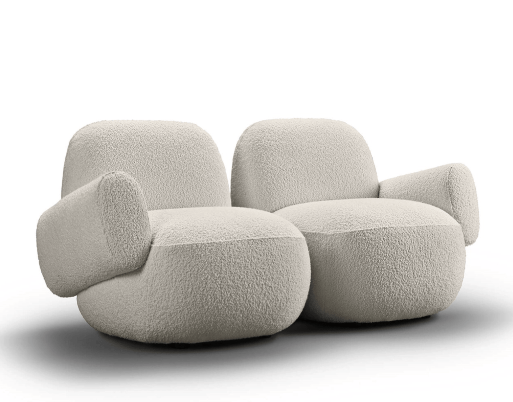 Double-seat version of Havana Round Arm Chair by Eilersen in light boucle, featuring plush curves and modern design.