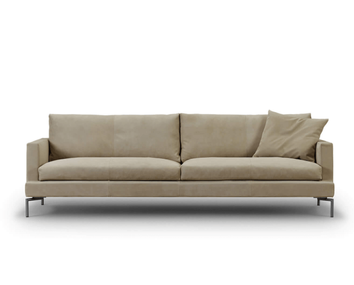 Loft Sofa by Eilersen in beige leather finish, featuring plush cushions and sleek metal legs, available at Trade Source Furniture.