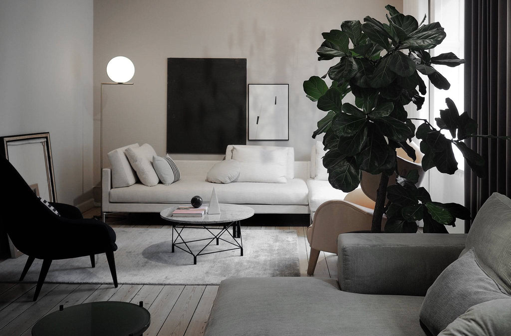 Plano Sectional Sofa by Eilersen in a stylish living room with layered lighting and neutral tones, ideal for modern home decor.