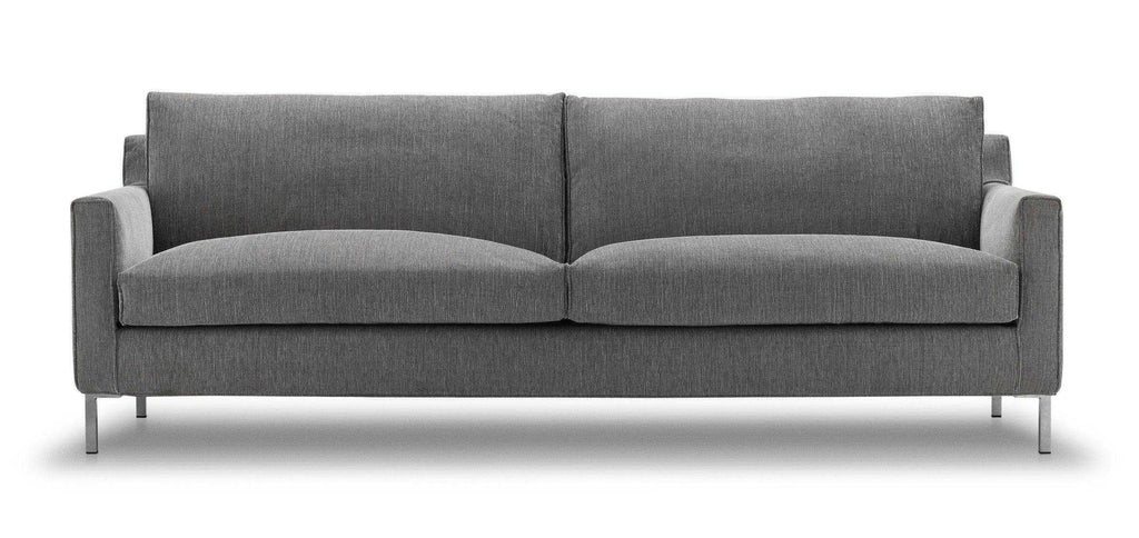Front view of the Streamline Sofa by Eilersen at Trade Source Furniture in grey fabric, emphasizing its clean lines and plush seating.