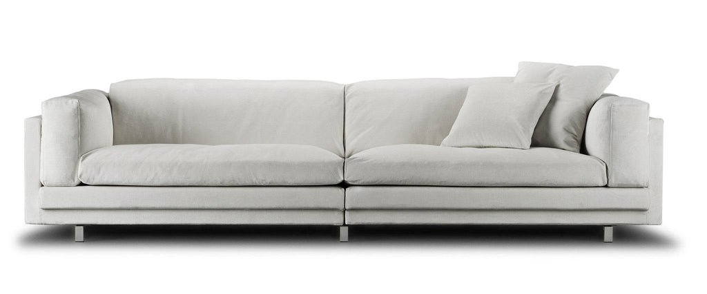 Front view of the Eilersen Tub Sofa in white fabric, featuring deep seating and minimalist design at Trade Source Furniture.