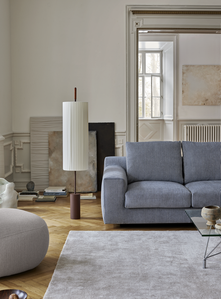 Striped version of the Aton Mini Sofa by Eilersen in a modern living room with neutral tones and soft lighting. A refined choice for stylish interiors.