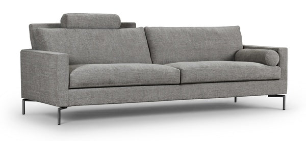 Angled side view of the Quick Ship Lift Sofa by Eilersen in grey, highlighting its sleek profile and plush seating.