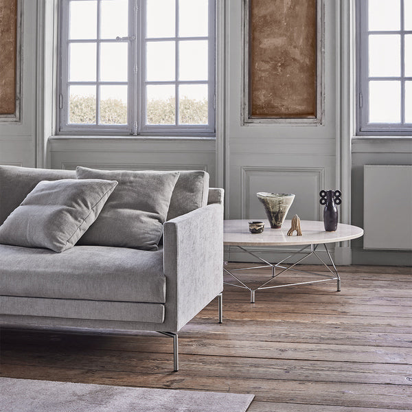 Ash Custom Fit Sofa by Eilersen in light grey fabric with plush cushions, styled in a classic interior at Trade Source Furniture.