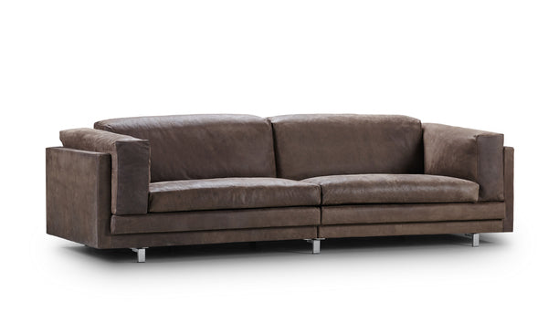 Angled view of the Tub Sofa by Eilersen in brown leather, combining comfort and modern elegance at Trade Source Furniture.