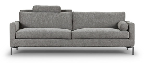 Front view of the Quick Ship Lift Sofa by Eilersen in grey fabric, featuring clean lines, metal legs, and a cylindrical pillow.