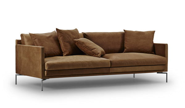 Angled view of Ash Custom Fit Sofa by Eilersen in brown upholstery, blending comfort and style at Trade Source Furniture.
