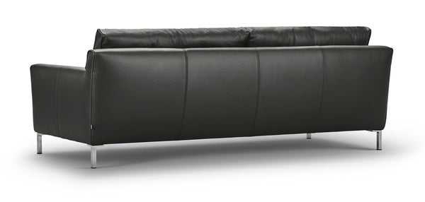 Rear angle of the Streamline Sofa by Eilersen at Trade Source Furniture in black leather, highlighting its smooth back and slim profile.
