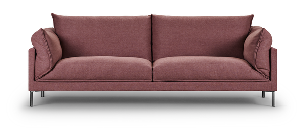 Front-facing view of Butterfly Sofa by Eilersen in rose fabric, featuring deep seat cushions and relaxed armrests for casual elegance.