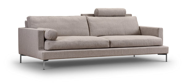Angled view of The Great Lift Sofa by Eilersen at Trade Source Furniture, showing its modern silhouette and supportive armrests.