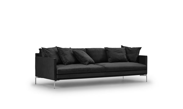 Ash Sofa by Eilersen in black fabric with sleek metal legs, offering a bold modern look at Trade Source Furniture.