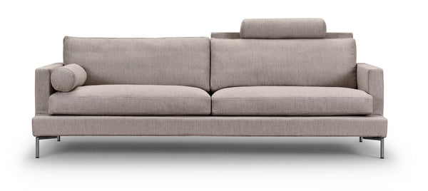 Front view of The Great Lift Sofa by Eilersen at Trade Source Furniture, emphasizing its symmetrical structure and adjustable headrest.
