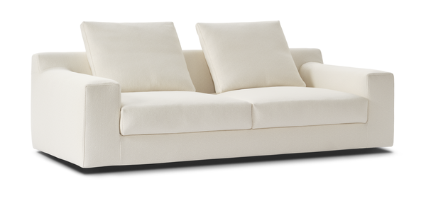 Front angle of the Aton Mini Sofa by Eilersen in white, showcasing its plush cushions and clean lines. Ideal for minimalist and modern interiors.